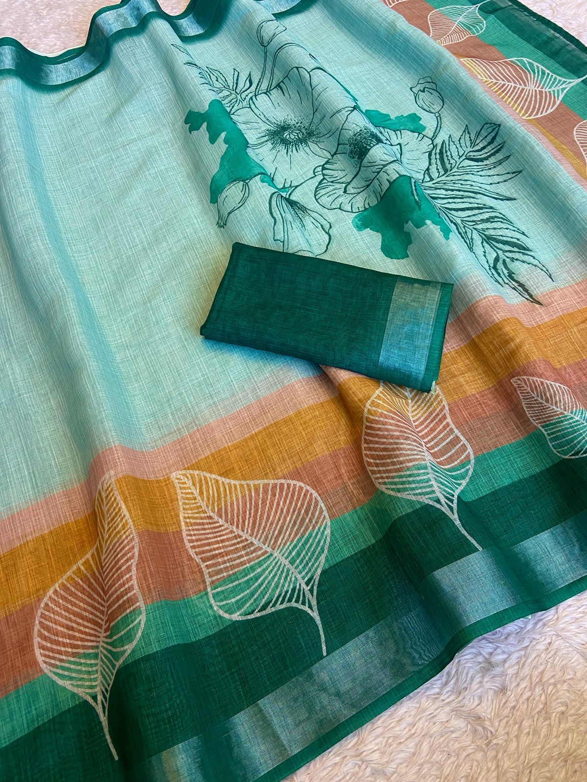 "White Leaf Elegance: Pure Cotton Saree for Graceful Charm"